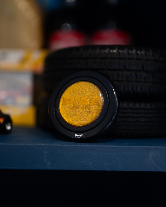 PIAA Black/Gold Horn Button